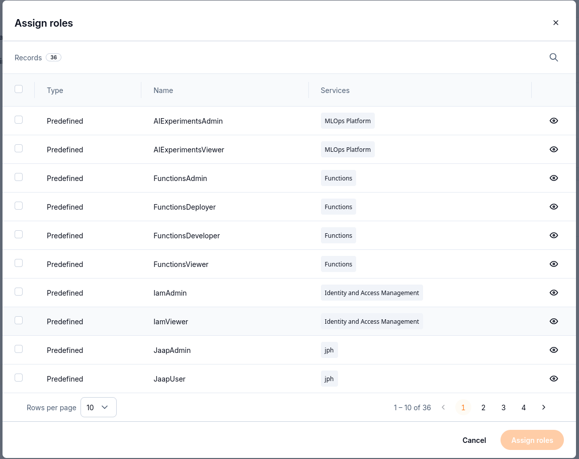 Assign roles dialog with role checkboxes, service names, and view icons.
