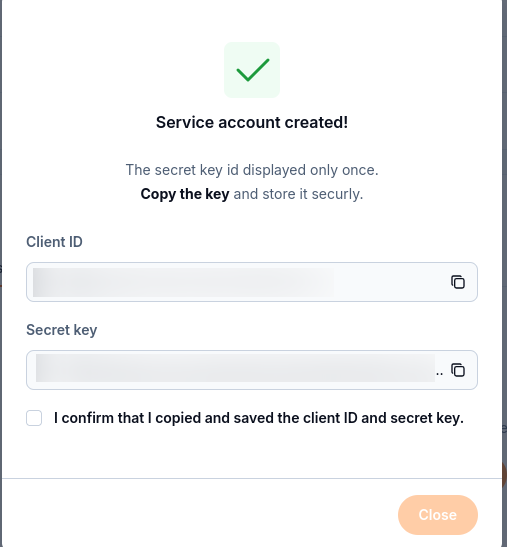 Service account created dialog with obscured Client ID and Secret key and a confirmation checkbox.