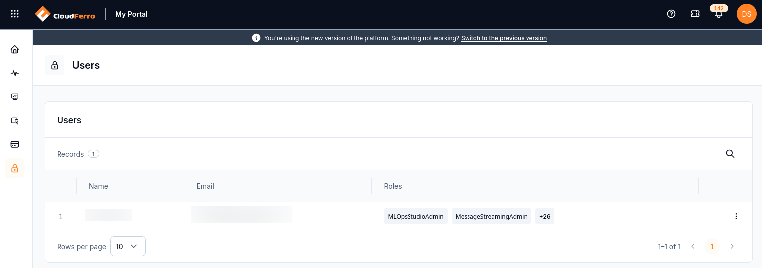 Users table with Name, Email, and Roles columns, a search control, and a three-dot menu for a user.